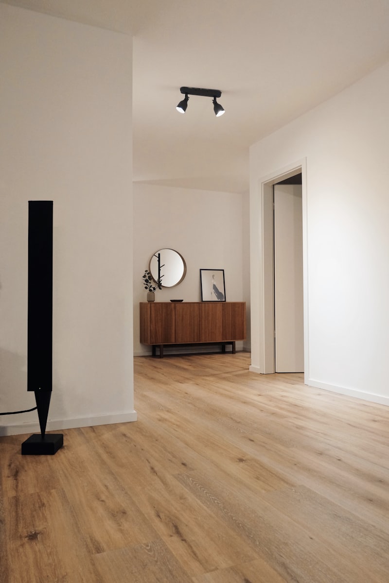 Room with newly installed wood-look plank flooring